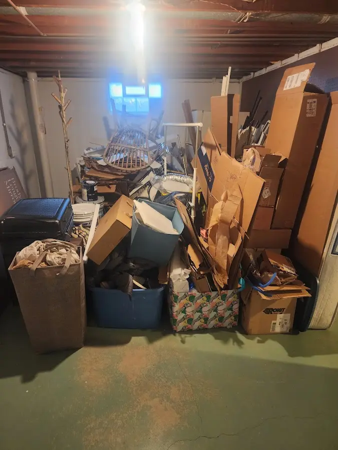 Roll-off dumpster container at job site for 8 Yard Dumpster Rental in Wendell